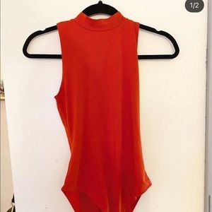 Orange high neck bodysuit